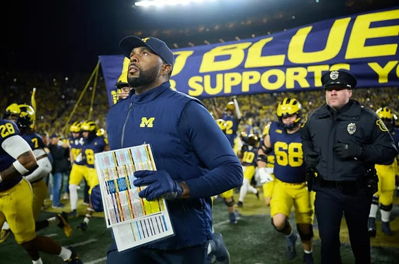 Sherrone Moore and Michigan Team