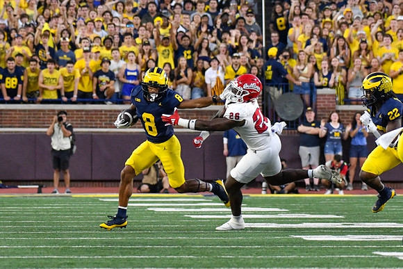 Tyler Morris (8) and Tavierre Dunlap (22)