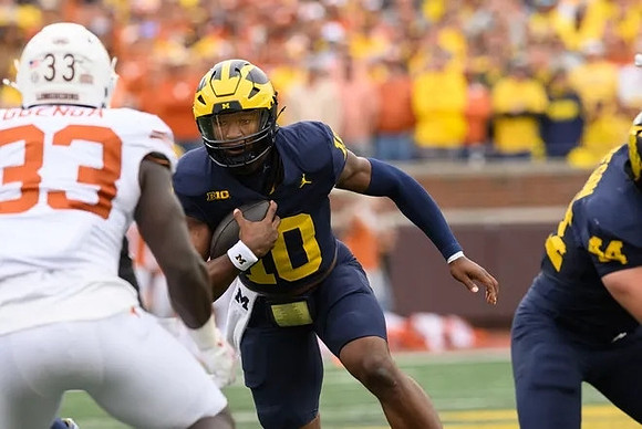 Alex Orji (10) and Max Bredeson (44)