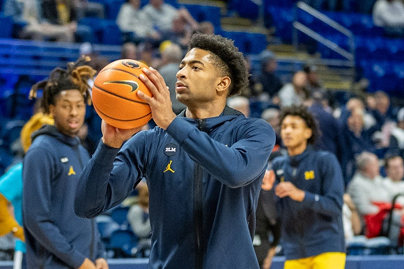 Gregg Glenn III (23), Jace Howard (25), and Kobe Bufkin (2)