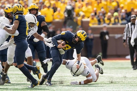 Ronnie Bell (8) and J.J. McCarthy (9)