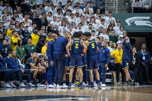 Juwan Howard and Michigan Team