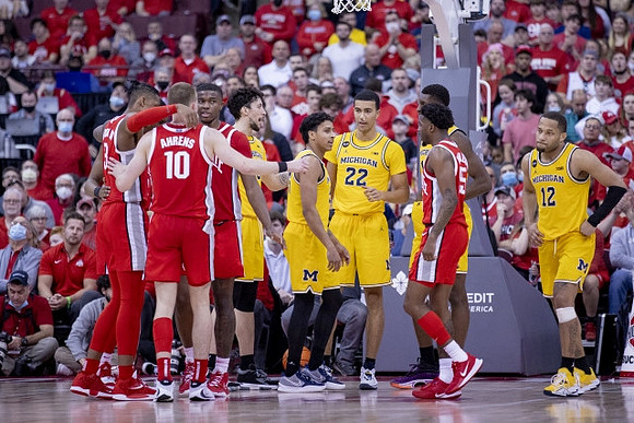 Brandon Johns Jr. (23), Eli Brooks (55), Caleb Houstan (22), Moussa Diabate (14), and DeVante' Jones (12)