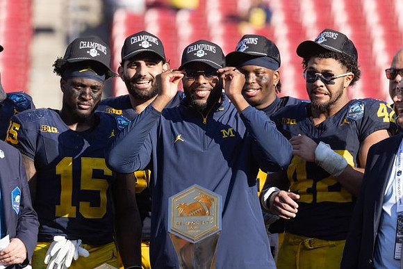 Sherrone Moore and Michigan Team