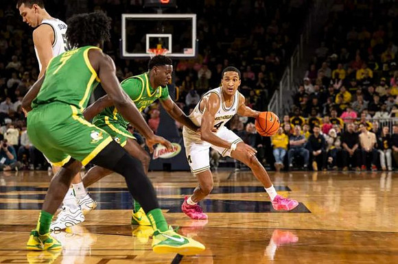 Vladislav Goldin (50) and Nimari Burnett (4)