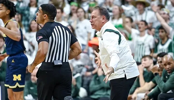 Kobe Bufkin (2) and Michigan State Head Coach Tom Izzo