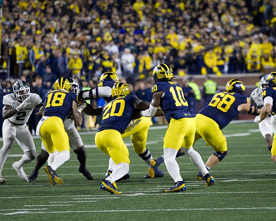 Colston Loveland (18), Kalel Mullings (20), Alex Orji (10), Josh Priebe (68), Myles Hinton (78), and Max Bredeson (44)