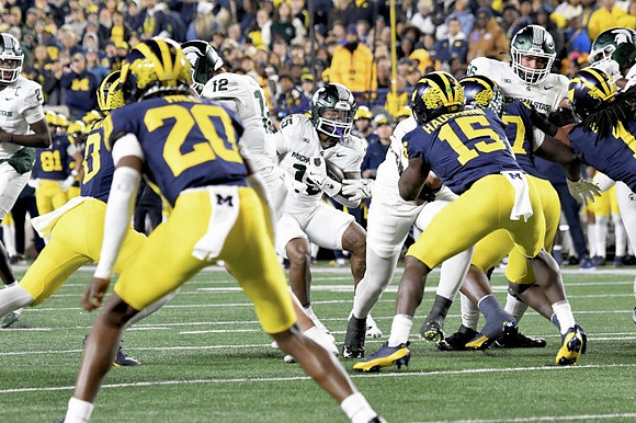 Josaiah Stewart (0), Jyaire Hill (20), and Ernest Hausmann (15)