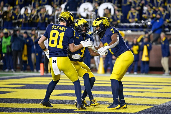 Peyton O'Leary (81), Fredrick Moore (3), and Donovan Edwards (7)