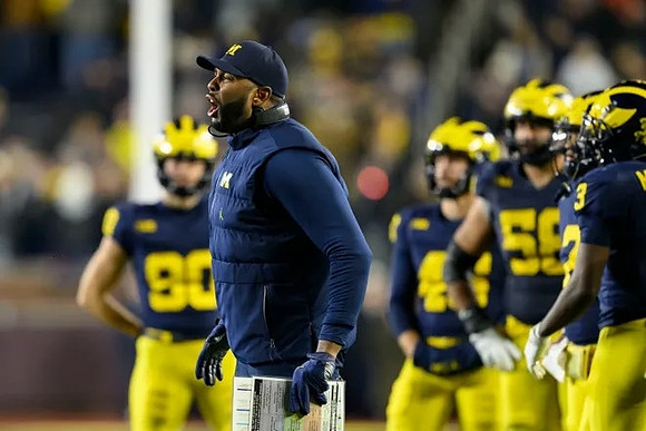Sherrone Moore and Michigan Team