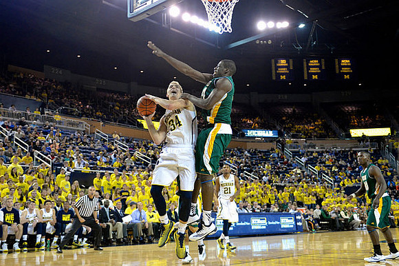 Mark Donnal (34) and Zak Irvin (21)