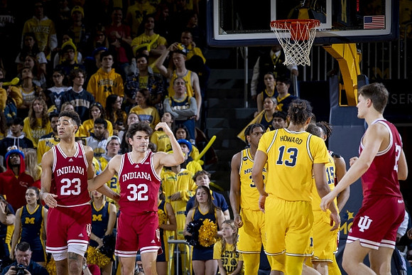 Jett Howard (13), Tarris Reed Jr. (32), and Joey Baker (15)