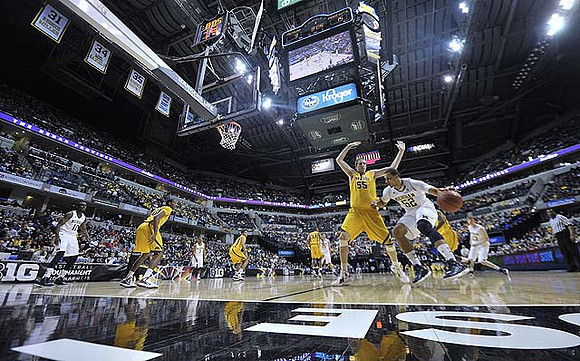 Tim Hardaway Jr. (10), Trey Burke (3), Evan Smotrycz (23), Jordan Morgan (52), and Matt Vogrich (13)