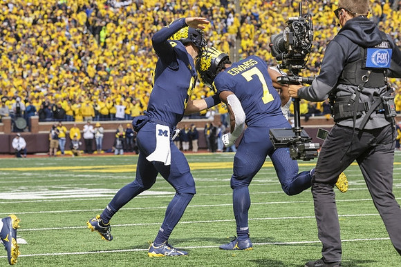 J.J. McCarthy (9) and Donovan Edwards (7)
