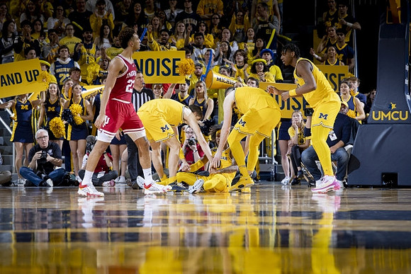 Joey Baker (15), Hunter Dickinson (1), Dug McDaniel (0), and Tarris Reed Jr. (32)