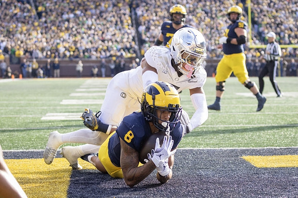 Tyler Morris (8) and Greg Crippen (51)