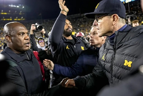 Michigan State Head Coach Mel Tucker and Jim Harbaugh