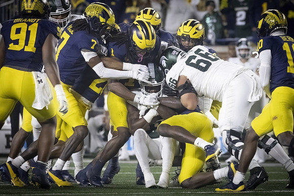 Cameron Brandt (91), Makari Paige (7), Jaishawn Barham (1), and Zeke Berry (10)