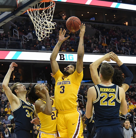 Mark Donnal (34) and Duncan Robinson (22)