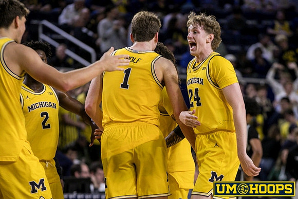 L.J. Cason (2), Danny Wolf (1), and Sam Walters (24)