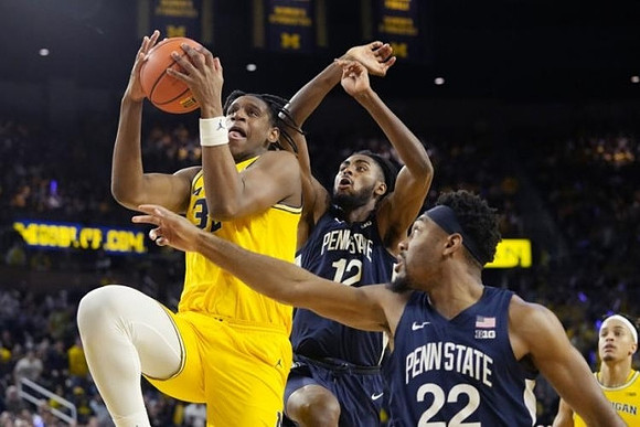 Tarris Reed Jr. (32) and Terrance Williams II (5)