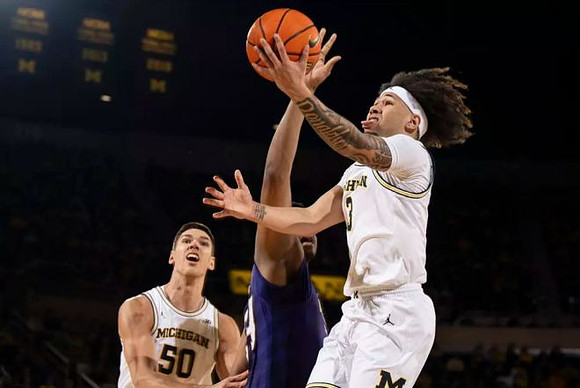 Vladislav Goldin (50) and Tre Donaldson (3)