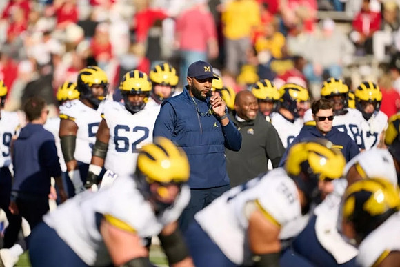 Sherrone Moore and Michigan Team
