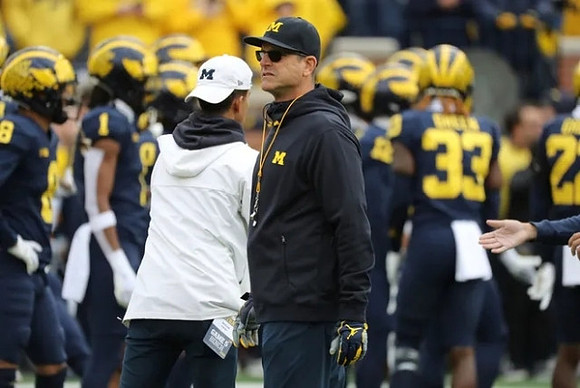 Jim Harbaugh and Michigan Team