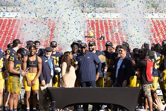 Sherrone Moore and Michigan Team