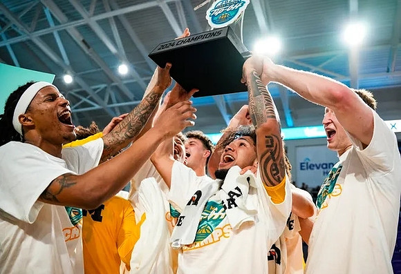 Michigan Team and Fort Myers Tip-Off Championship Trophy
