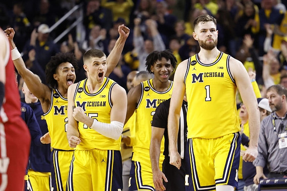 Kobe Bufkin (2), Joey Baker (15), Tarris Reed Jr. (32), and Hunter Dickinson (1)