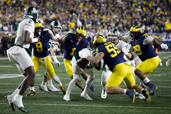 Derrick Moore (8), Jaishawn Barham (1), Mason Graham (55), and Kenneth Grant (78)