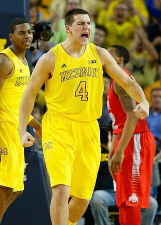 Glenn Robinson III (1) and Mitch McGary (4)