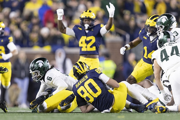 Jalen Hoffman (42), Hogan Hansen (80), and Channing Goodwin (14)