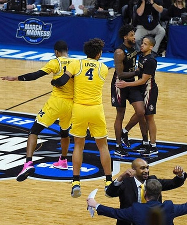 Muhammad-Ali Abdur-Rahkman (12), Isaiah Livers (4), Saddi Washington, and Luke Yaklich