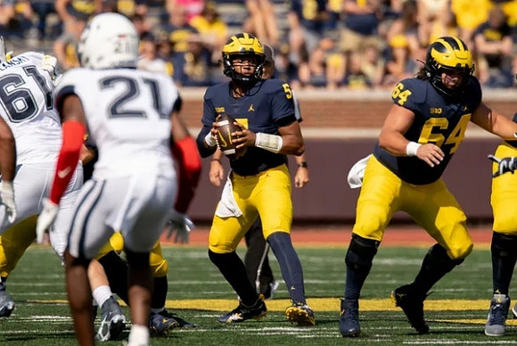 Brandon Mann (5) and James Kavouklis (64)