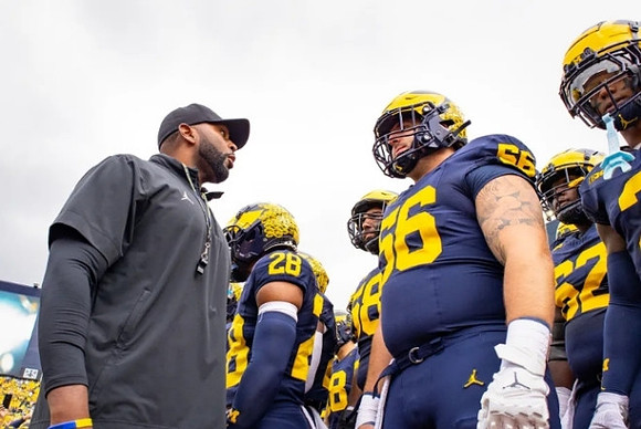 Sherrone Moore and Michigan Team