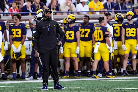 Sherrone Moore and Michigan Team