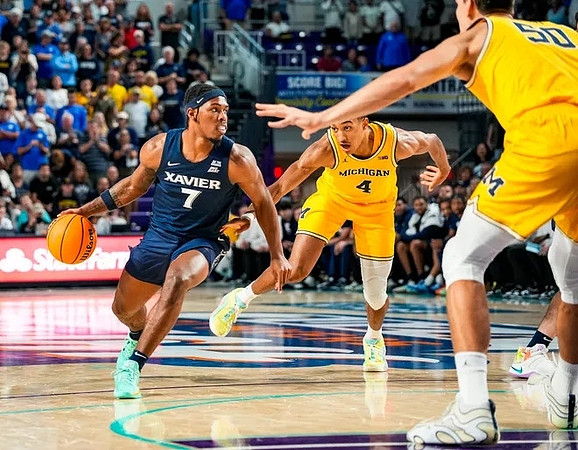 Nimari Burnett (4) and Vladislav Goldin (50)