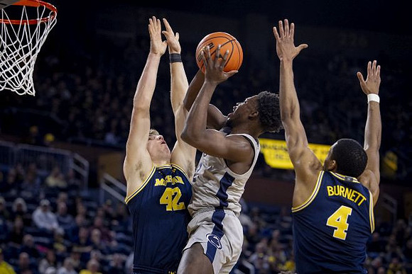 Will Tschetter (42) and Nimari Burnett (4)