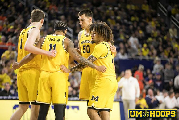 Danny Wolf (1), Roddy Gayle Jr. (11), Vladislav Goldin (50), and Tre Donaldson (3)