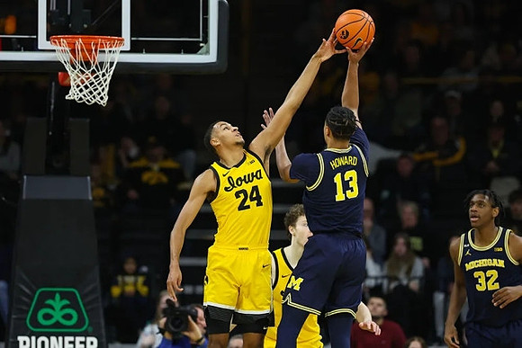 Jett Howard (13) and Tarris Reed Jr. (32)