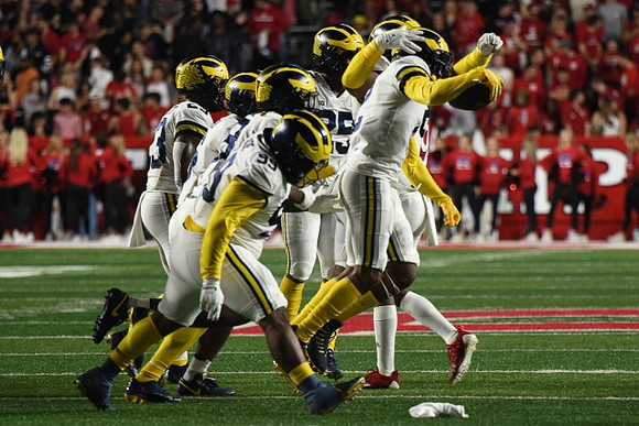 Michael Barrett (23), Cam Goode (99), Junior Colson (25), and Will Johnson (2)