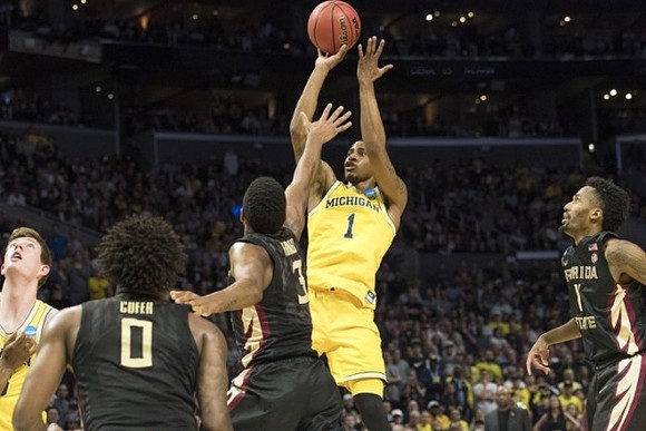 Jon Teske (15) and Charles Matthews (1)