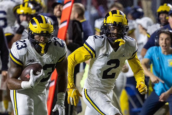 Michael Barrett (23) and Will Johnson (2)