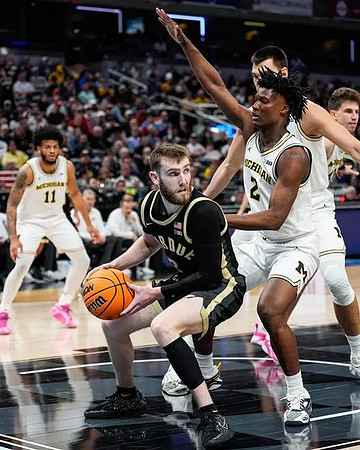 Roddy Gayle Jr. (11), L.J. Cason (2), and Vladislav Goldin (50)