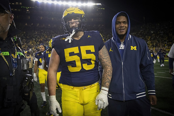 Mason Graham (55) and Will Johnson (2)