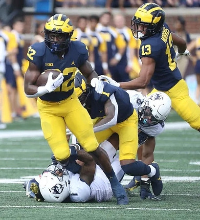 Tavierre Dunlap (22) and Tyler Morris (13)