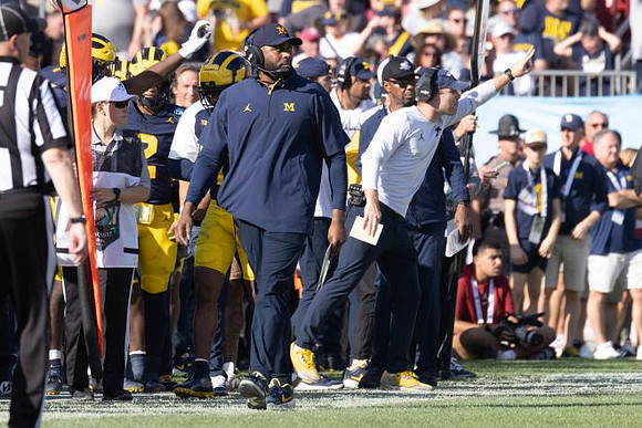 Sherrone Moore and Michigan Team