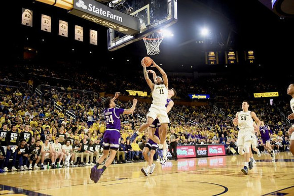 Roddy Gayle Jr. (11), Vladislav Goldin (50), and Nimari Burnett (4)